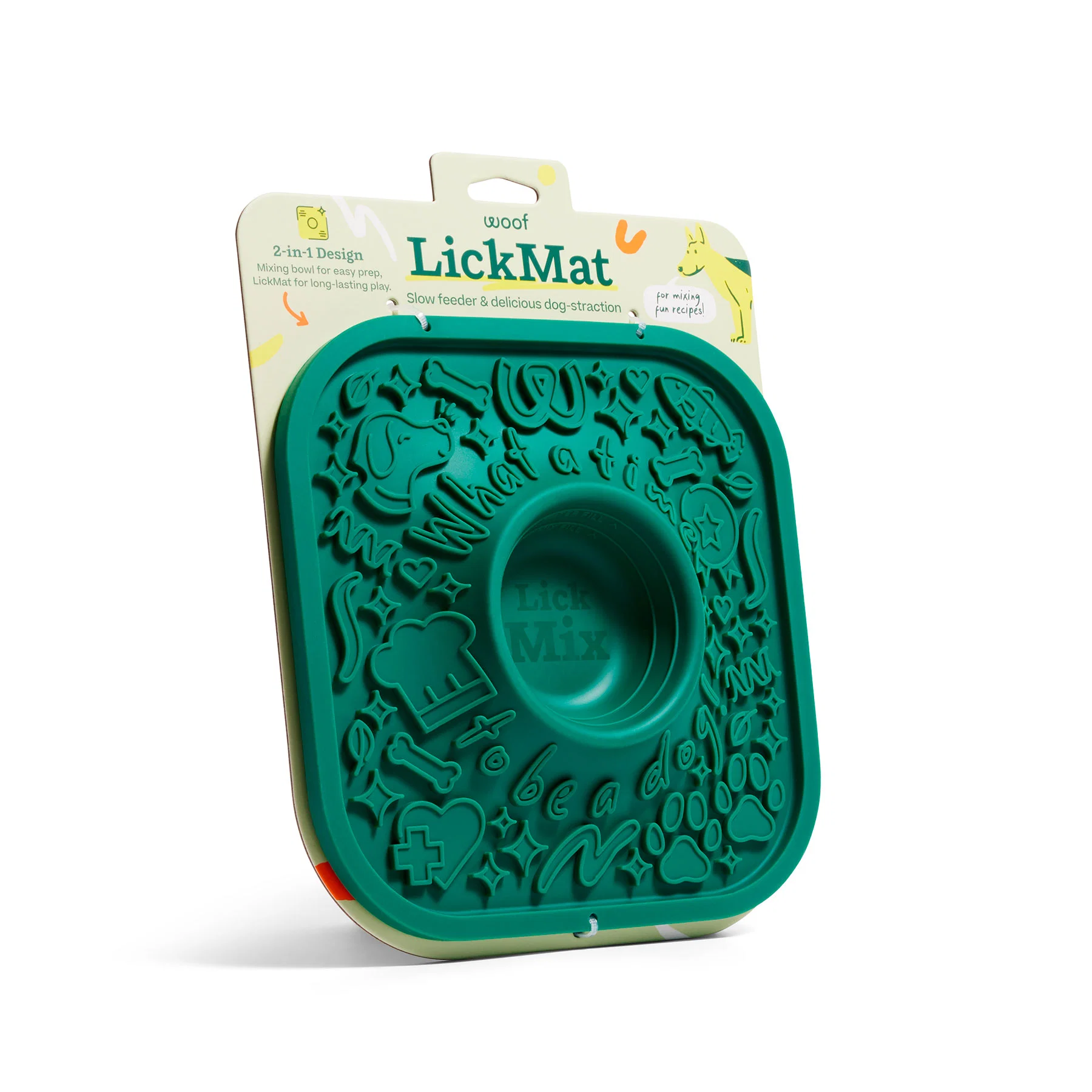 Teal LickMat dog slow-feeder silicone tray with embossed shapes, shown against its packaging featuring a dog illustration and the LickMat branding.